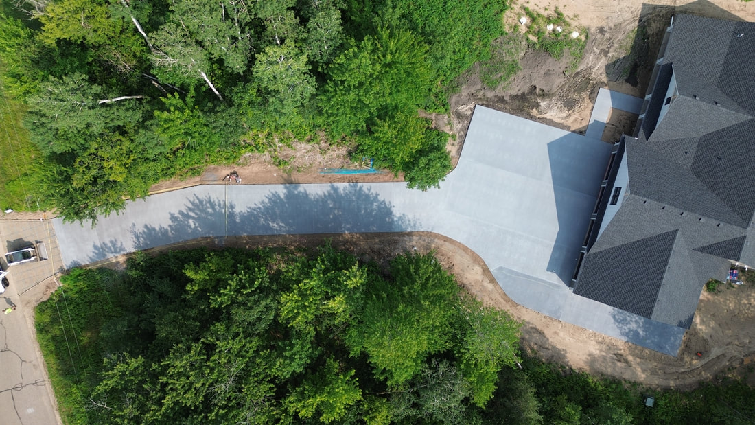 Concrete Driveway Contractor Near Me, Best Concrete Driveway Company, Concrete Driveway Installer Blaine, Andover, Anoka, Ham Lake, Oak Grove, Ramsey, Maple Grove, North Oaks