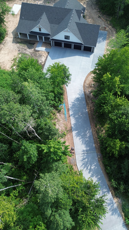 concrete driveway contractor anoka county, best concrete driveway company, concrete contractor near me, concrete company blaine, ham lake, andover